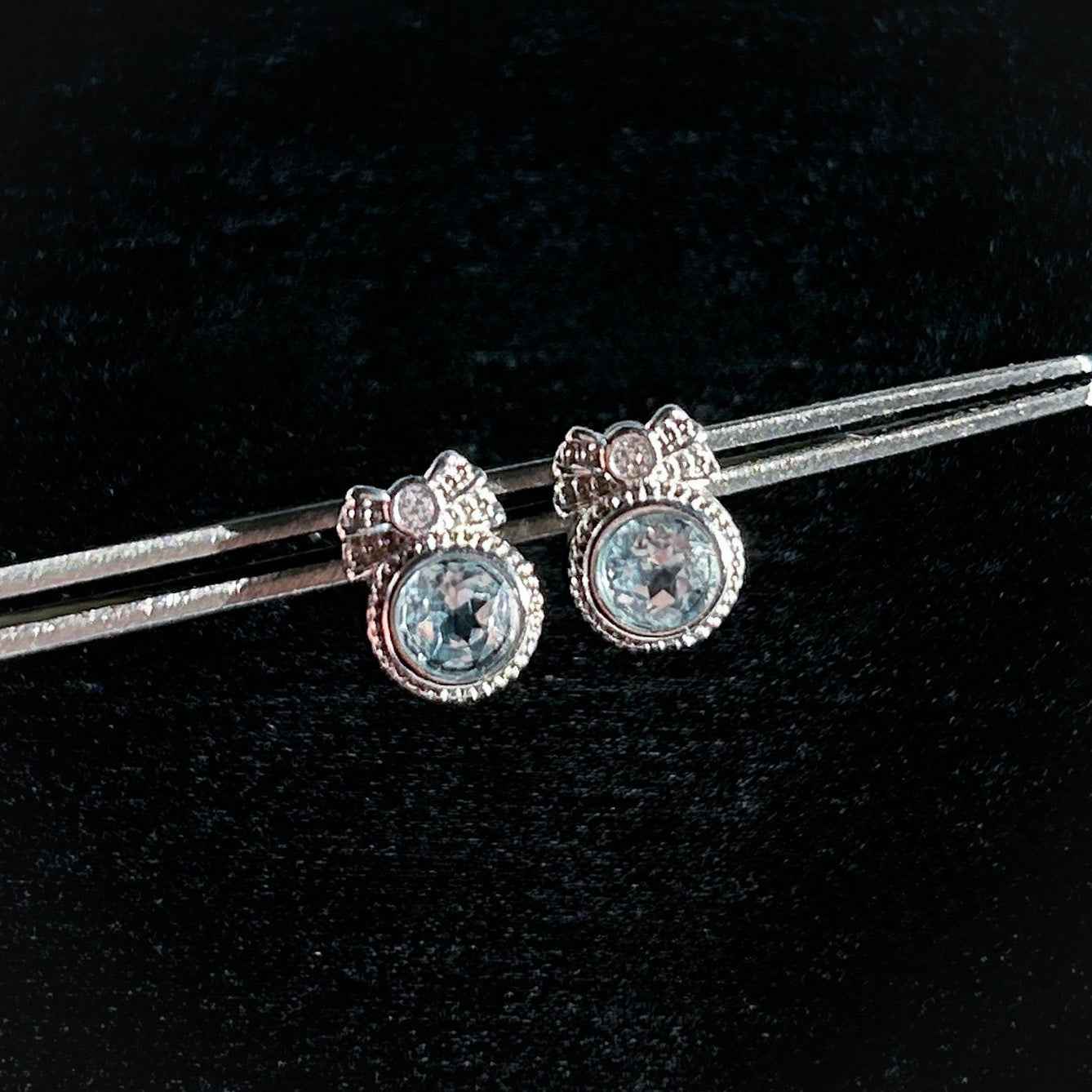 Blue Topaz with Ribbon Silver Stud Earrings