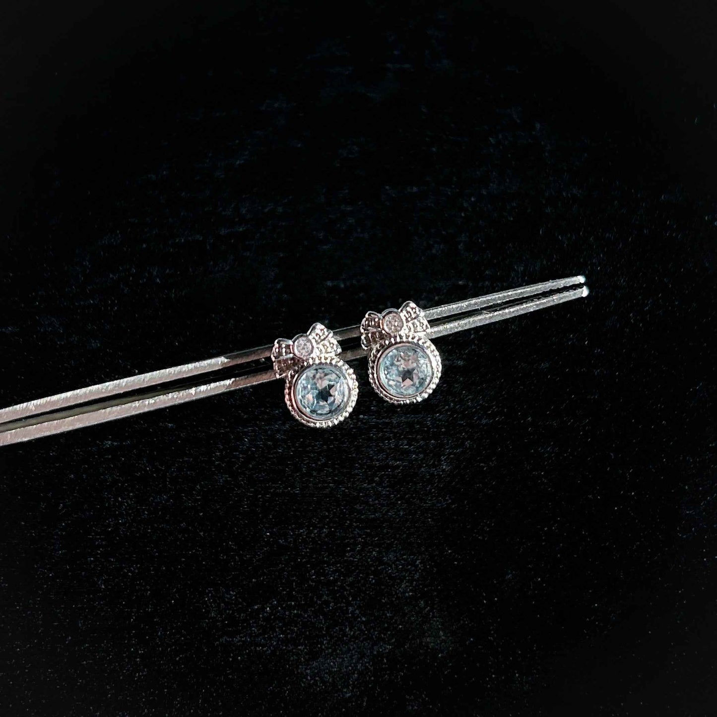 Blue Topaz with Ribbon Silver Stud Earrings