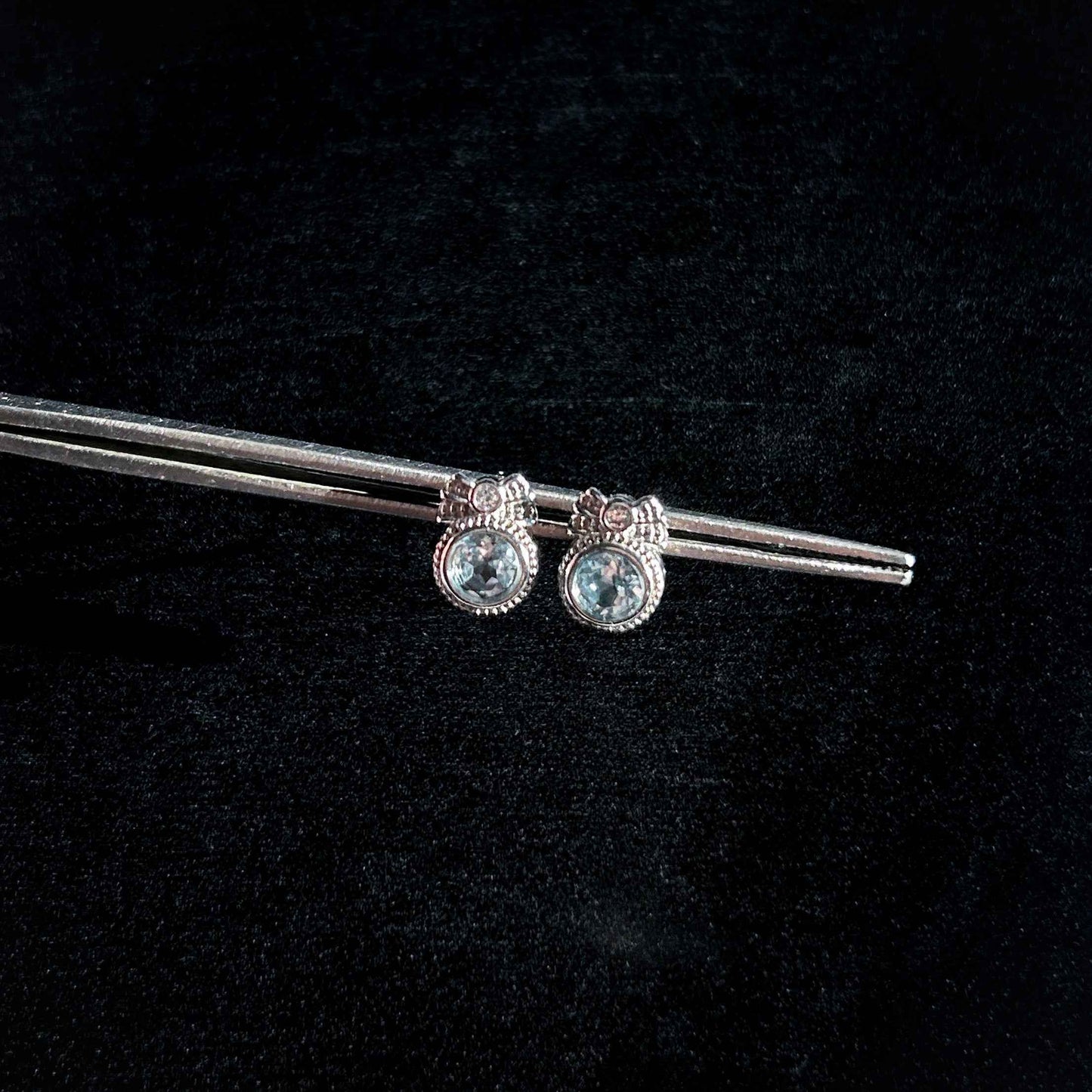 Blue Topaz with Ribbon Silver Stud Earrings